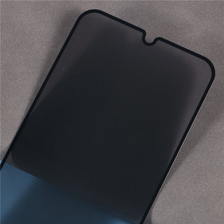 Nærbillede af hærdet glas på Redmi 14C