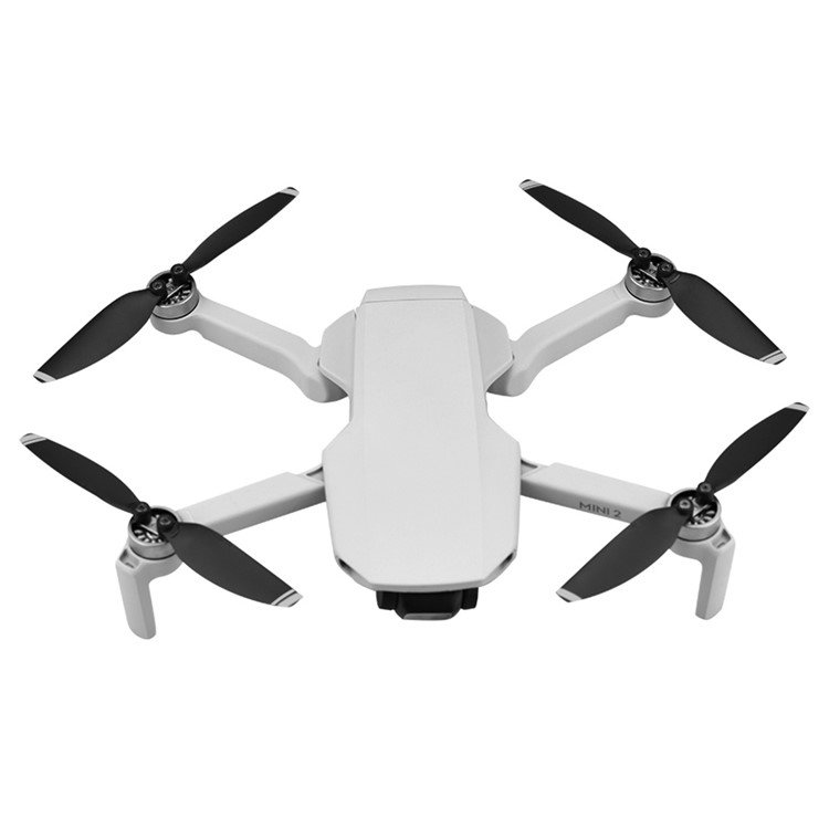 DJI Mini propeller sammenlignet med en hånd