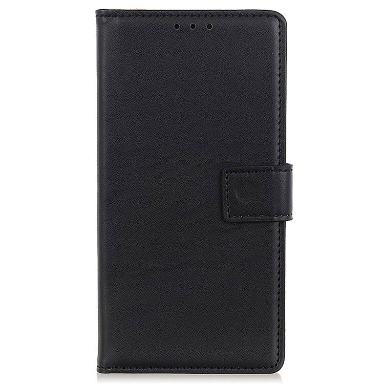 Google Pixel 8a sort etui på bord med standerfunktion aktiveret