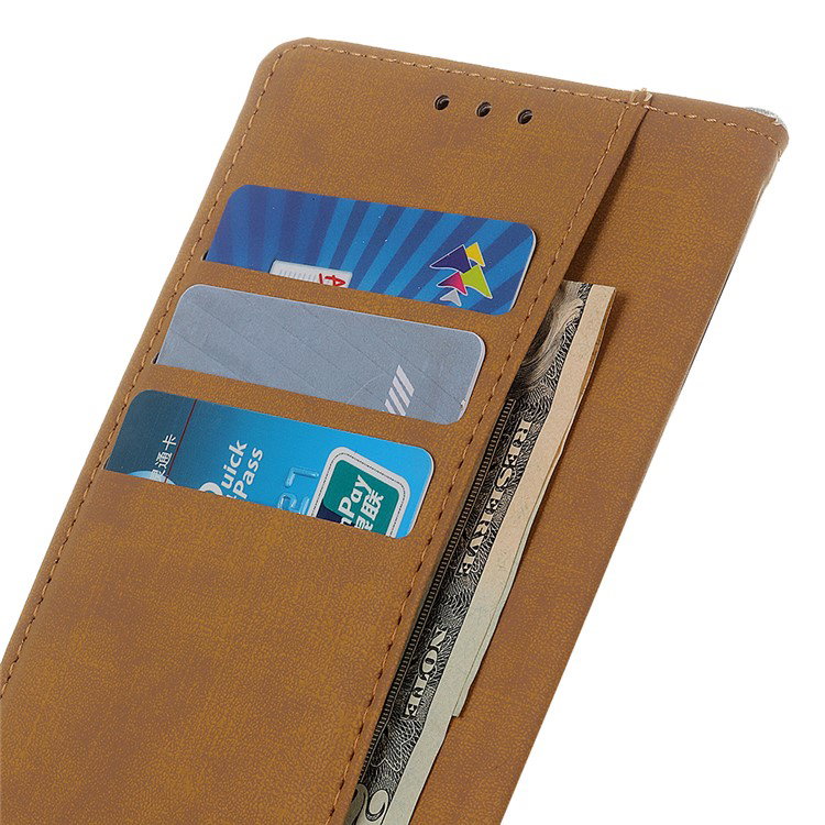 Google Pixel 8a beskyttet i sort etui set bagfra