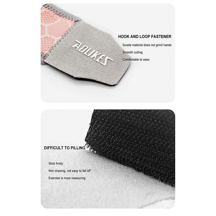 Grå håndledsstøtte med tommelfingerhul