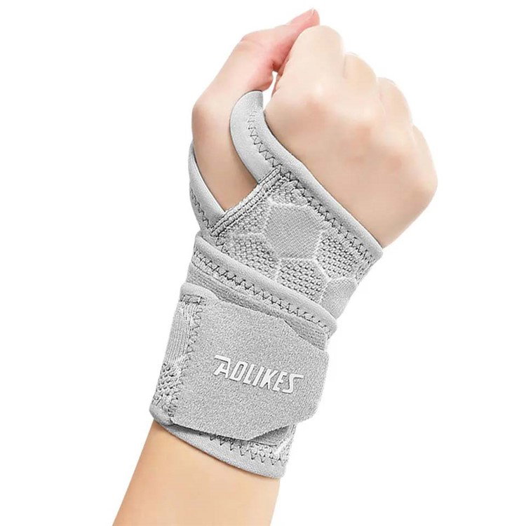 Elastisk strikket håndledsstøtte med ventilationshuller