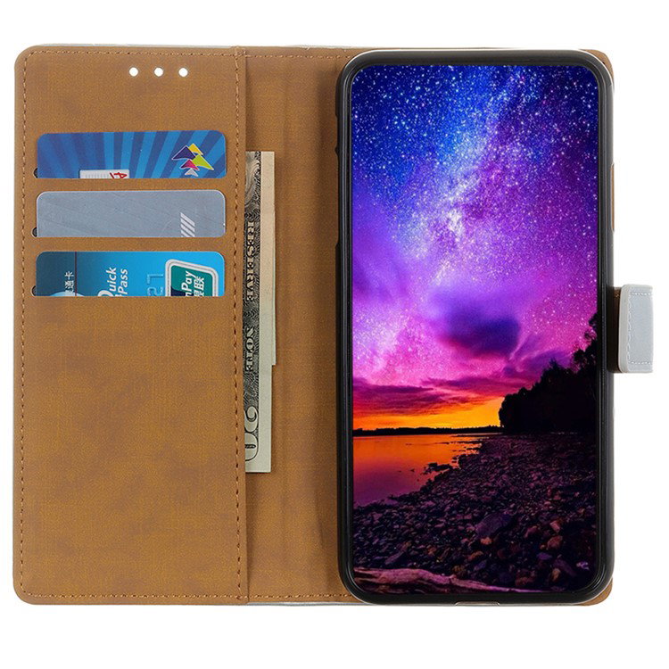 Foldet standerfunktion med Google Pixel 8a i sort etui