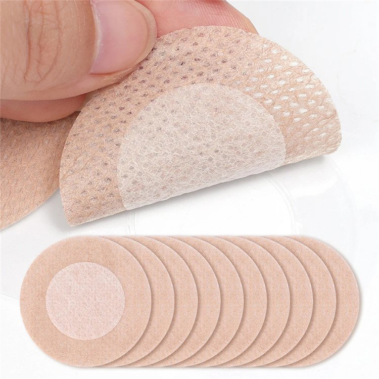 Øverste lag fjernet fra nipple cover